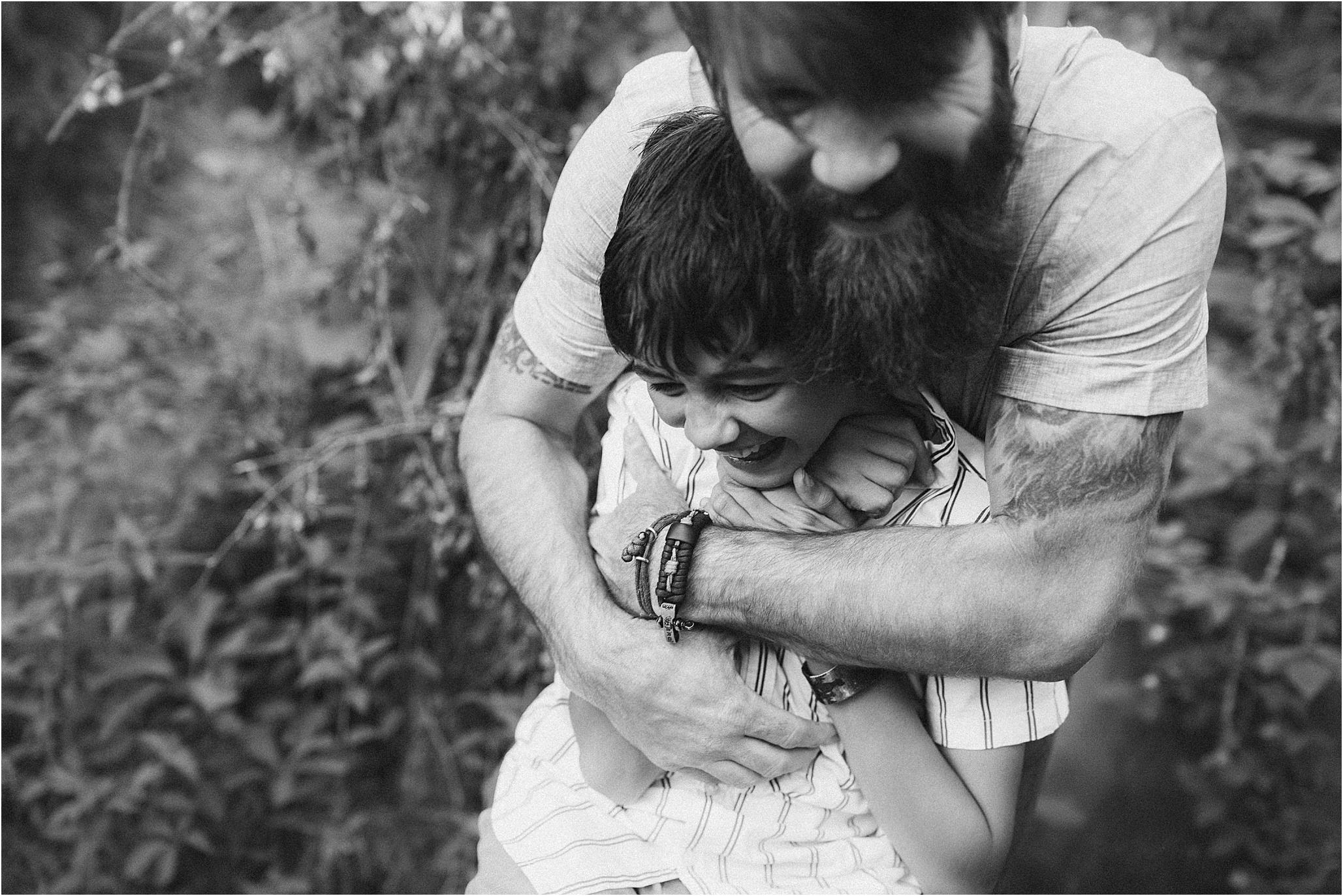 dad hugging son