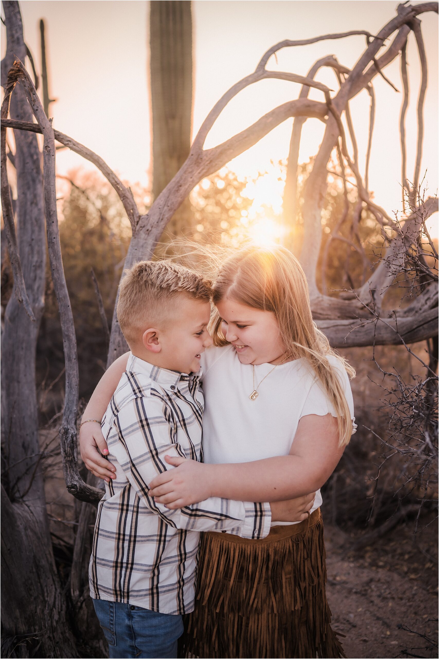 family photos Madison Wisconsin neutral coordinated outfits in natural outdoor setting